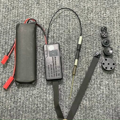 Camera Cúc Áo V99XS – module V99XS và đầu ống kính trên nền sáng